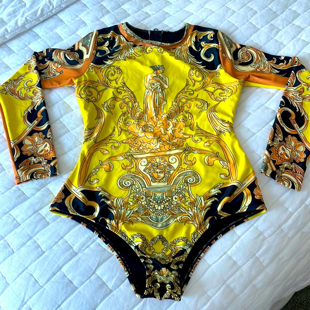 Long sleeve one piece swimsuit. Size M